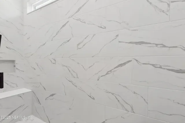 a view of swimming pool with an ocean view