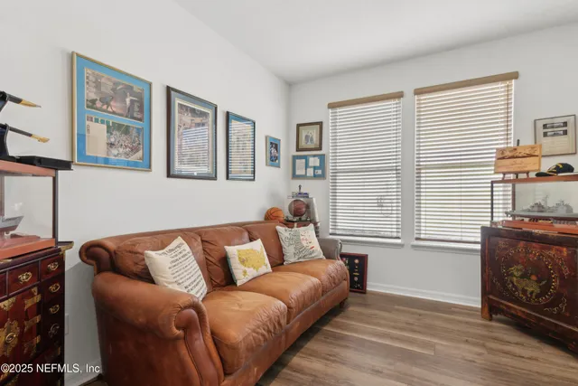 a kitchen with stainless steel appliances granite countertop white cabinets a sink and dishwasher