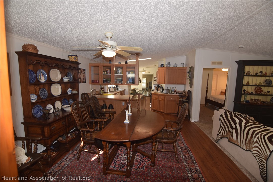 3124 White Oak Road Lorida, FL 33857 - Photo 21 of 34 a view of a dining room with furniture