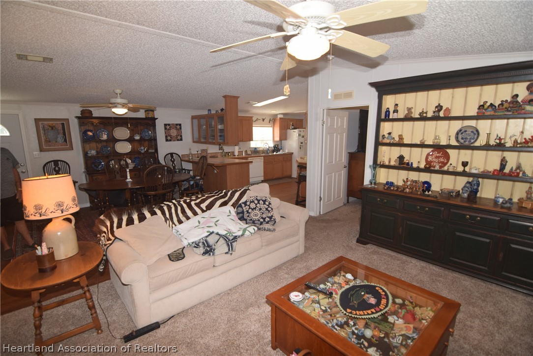 3124 White Oak Road Lorida, FL 33857 - Photo 27 of 34 a living room with furniture and wooden floor