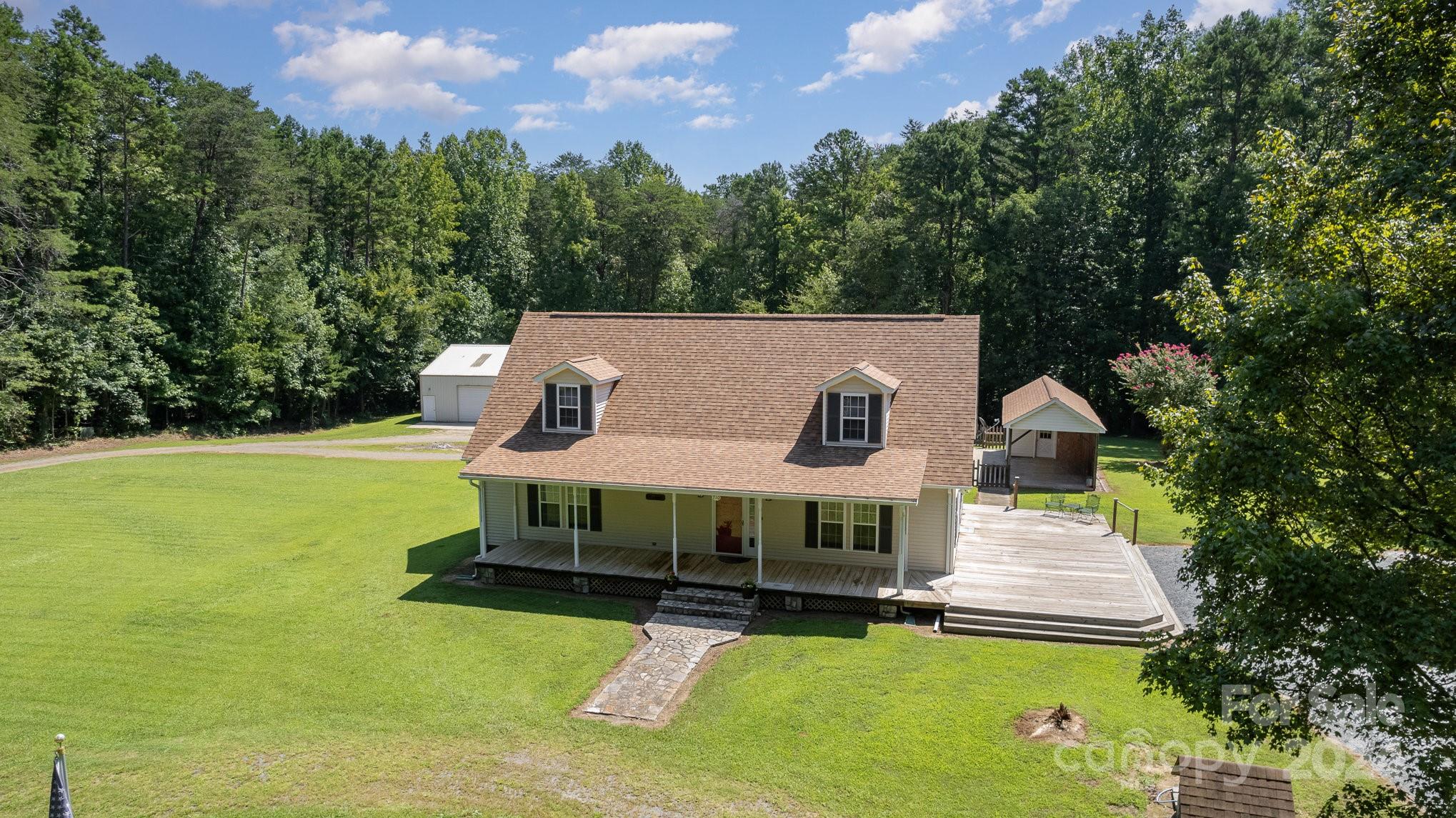 710 Rothrock Road Rockwell, NC 28138 - Photo 27 of 29 a view of a house with a big yard