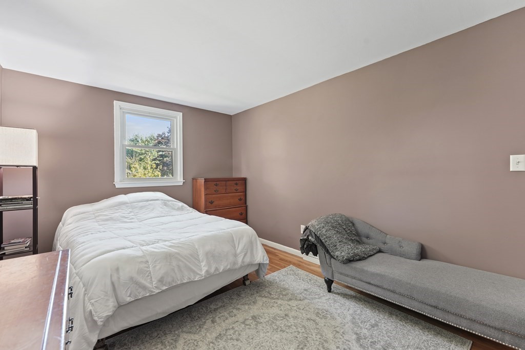 5 Virginia Road Medway, MA 02053 - Photo 17 of 29 a bedroom with a bed couch and a window