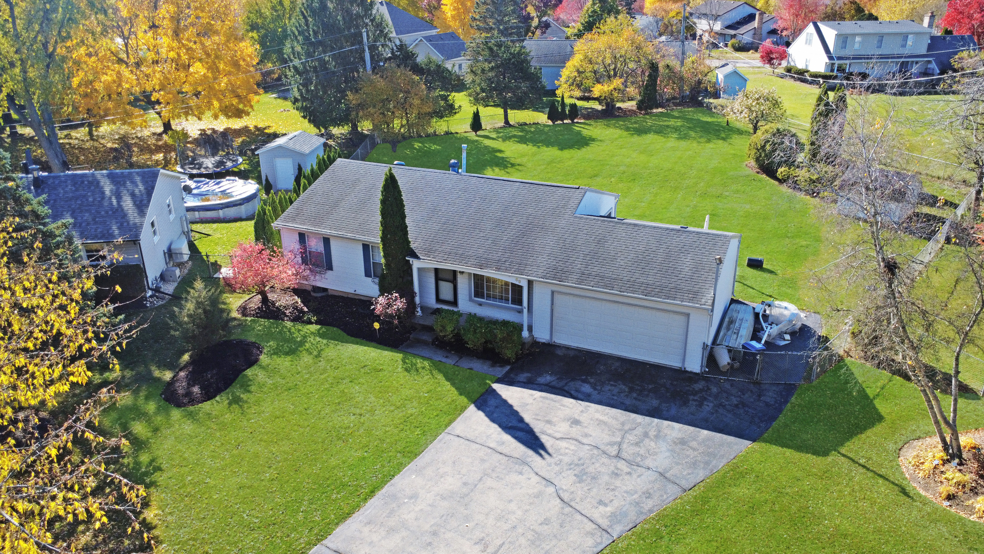 69 Alice Lane Algonquin, IL 60102 - Photo 1 of 14 a view of house with garden space and street view