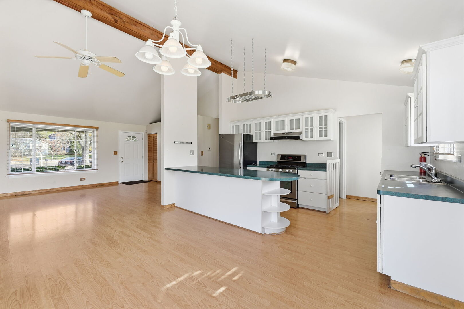 69 Alice Lane Algonquin, IL 60102 - Photo 7 of 14 a living room with stainless steel appliances kitchen island granite countertop furniture and a kitchen view