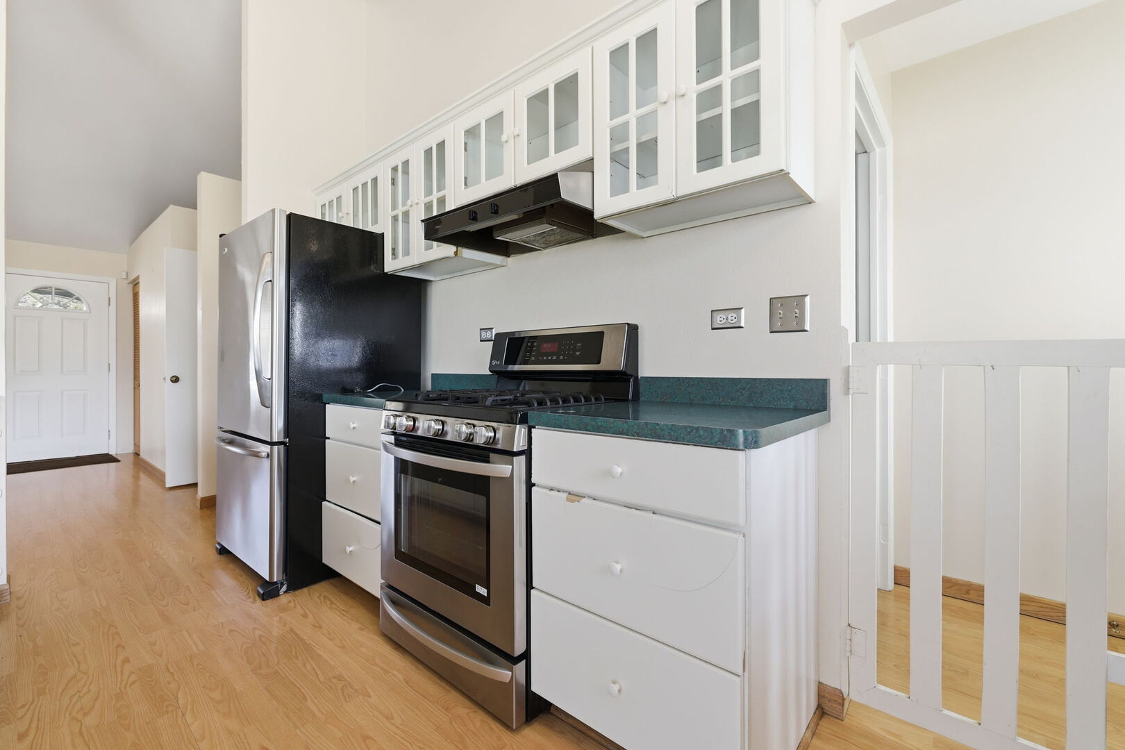 69 Alice Lane Algonquin, IL 60102 - Photo 3 of 14 a kitchen with stainless steel appliances granite countertop a refrigerator and a stove