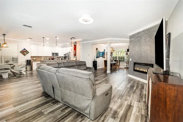 a kitchen with a sink cabinets and window