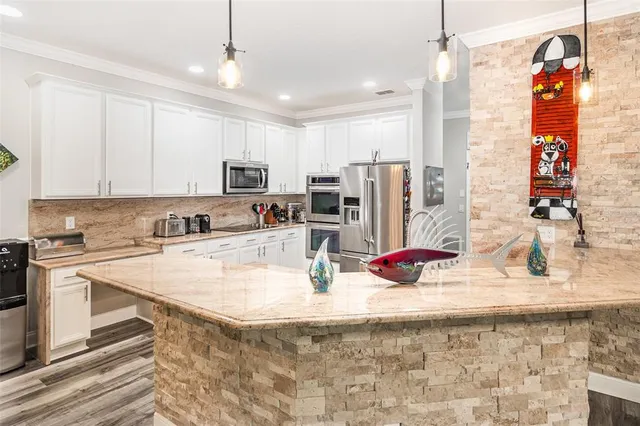 a bedroom with a bed and a book shelf