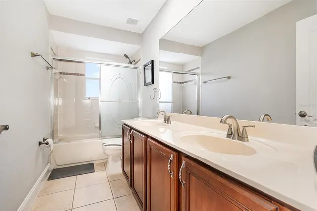 a view of a swimming pool and an outdoor seating