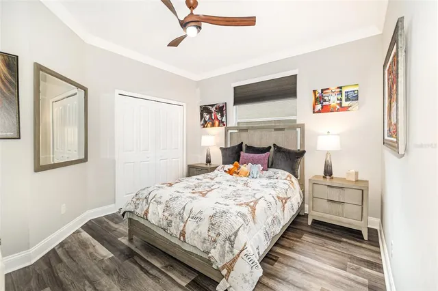 a living room with furniture a piano and a window