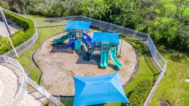 a bathroom with a granite countertop shower and a bathtub