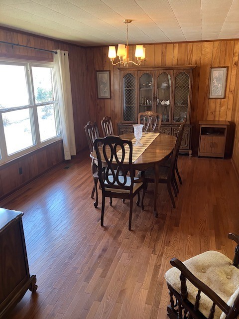 2442 Sherwood Road Sewanee, TN 37375 - Photo 9 of 11 a view of a dining room with furniture window and wooden floor