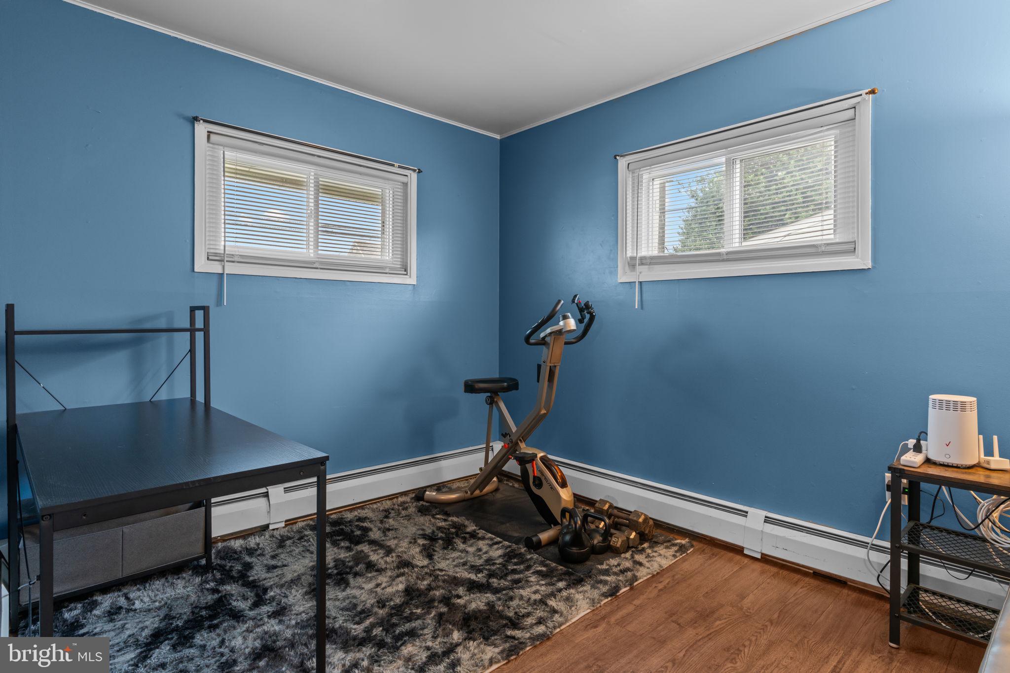 17 Middle Road Levittown, PA 19056 - Photo 11 of 22 a room with furniture and a window