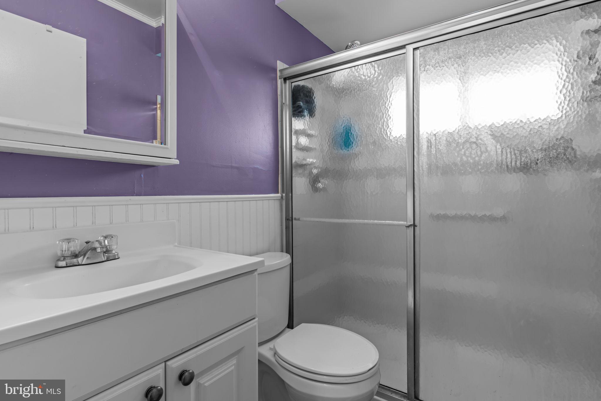 17 Middle Road Levittown, PA 19056 - Photo 12 of 22 a bathroom with a sink a toilet and shower