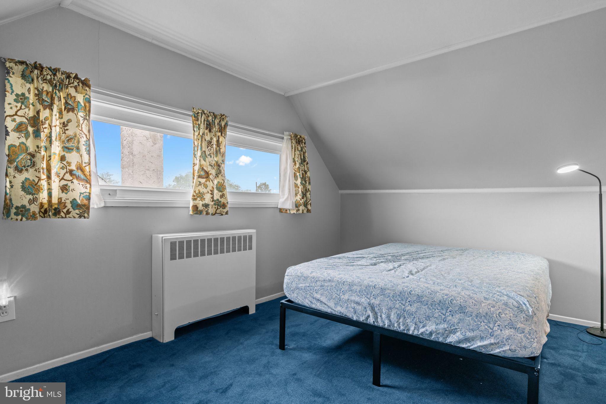 17 Middle Road Levittown, PA 19056 - Photo 13 of 22 a bedroom with a bed and a window