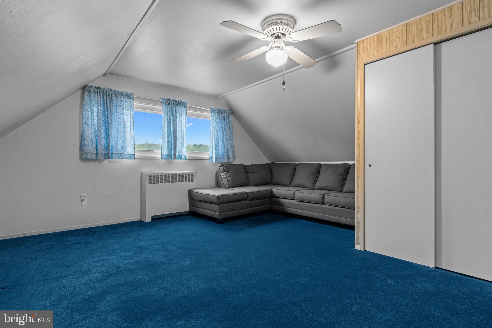 17 Middle Road Levittown, PA 19056 - Photo 15 of 22 a living room with furniture and a window