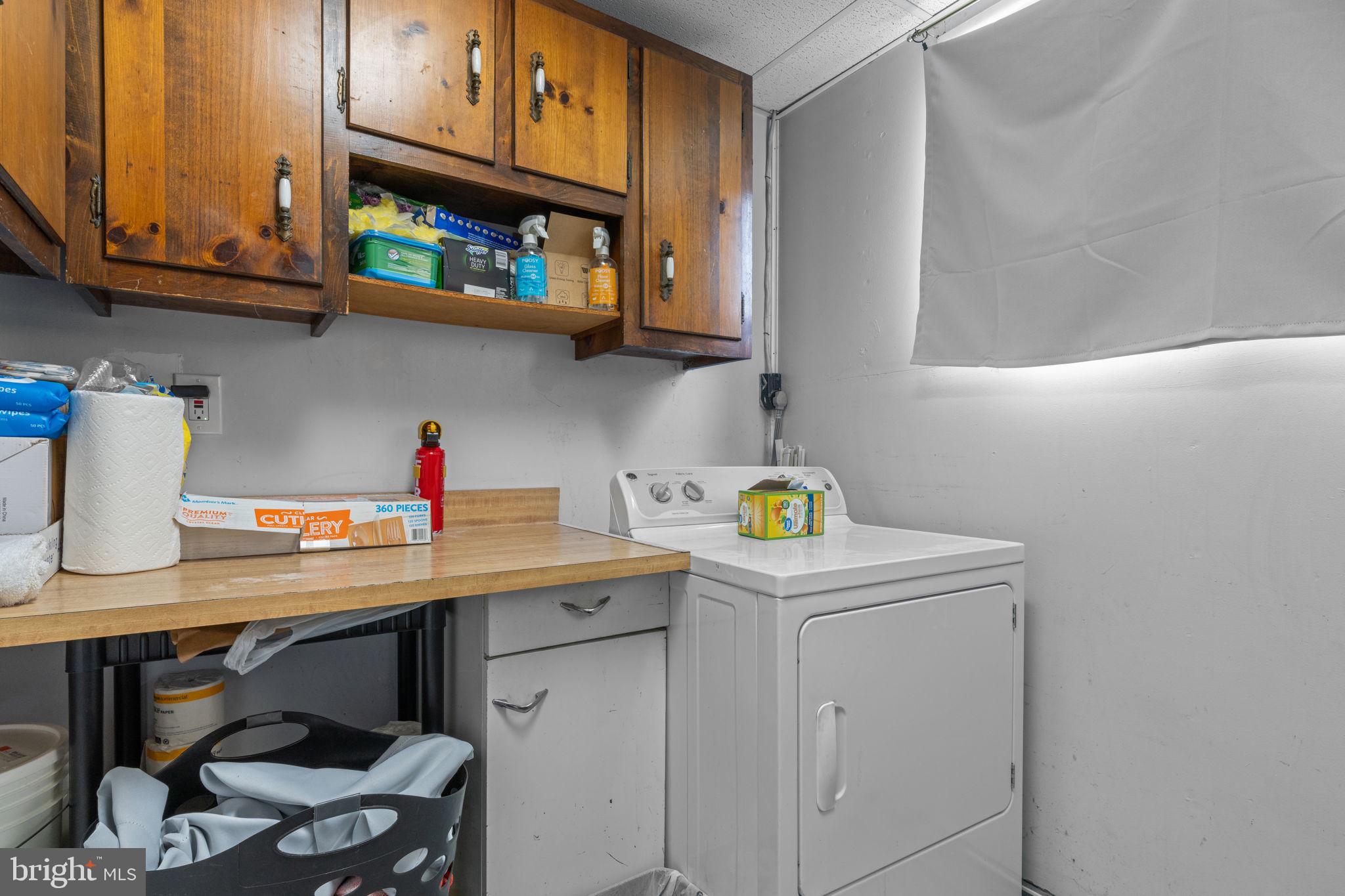 17 Middle Road Levittown, PA 19056 - Photo 16 of 22 a kitchen with stainless steel appliances granite countertop a sink a stove and cabinets