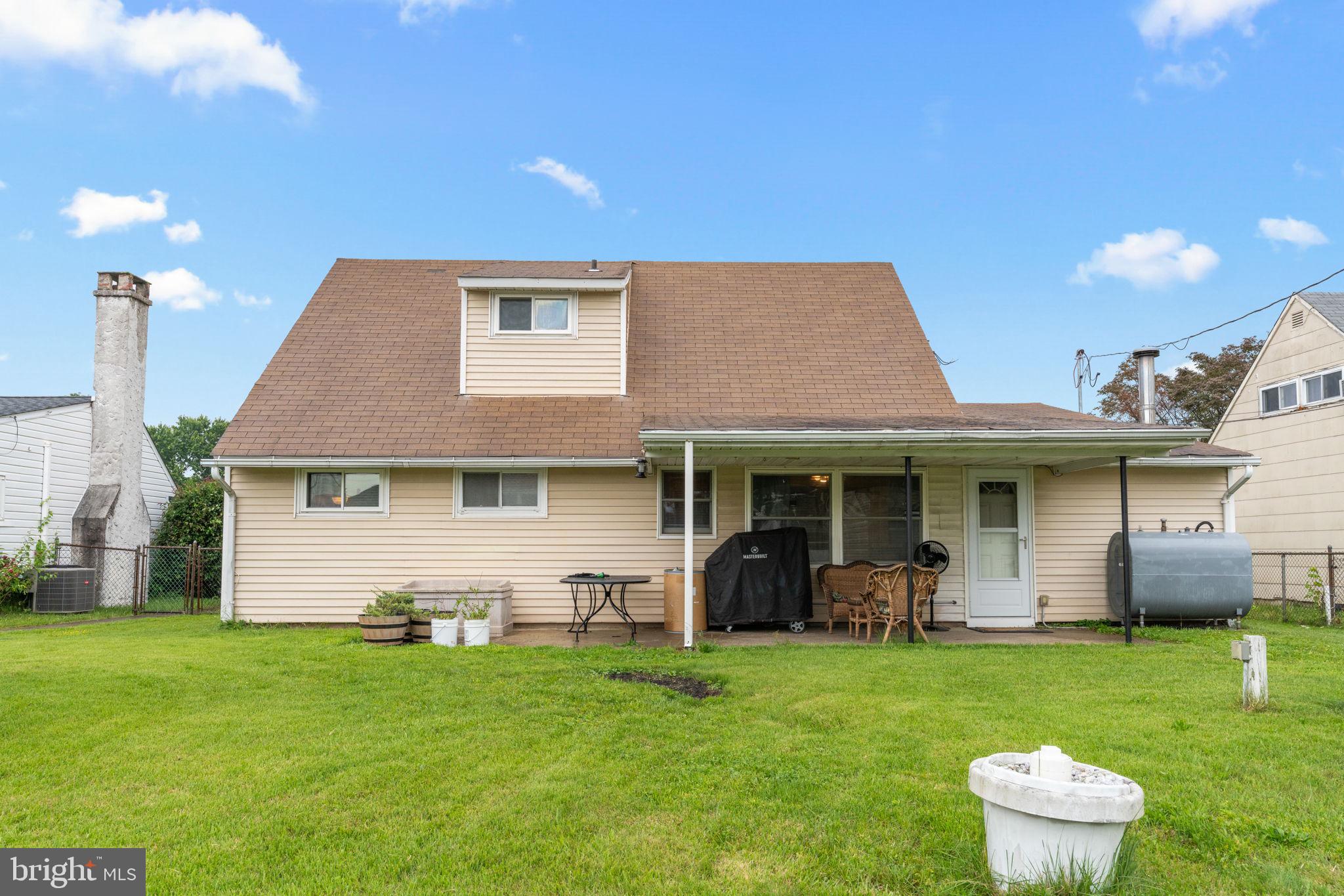 17 Middle Road Levittown, PA 19056 - Photo 20 of 22 a view of a house with a backyard