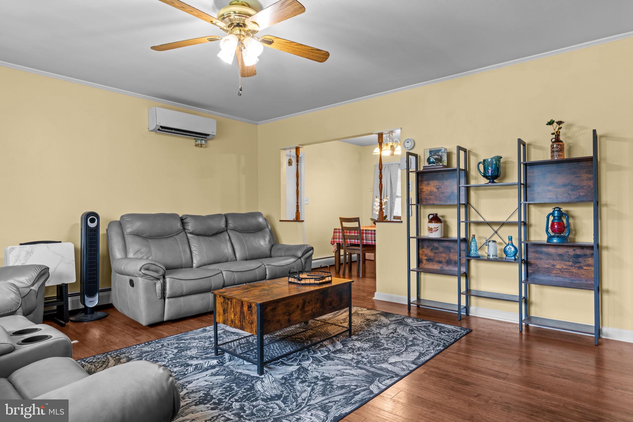 17 Middle Road Levittown, PA 19056 - Photo 3 of 22 a living room with furniture and wooden floor