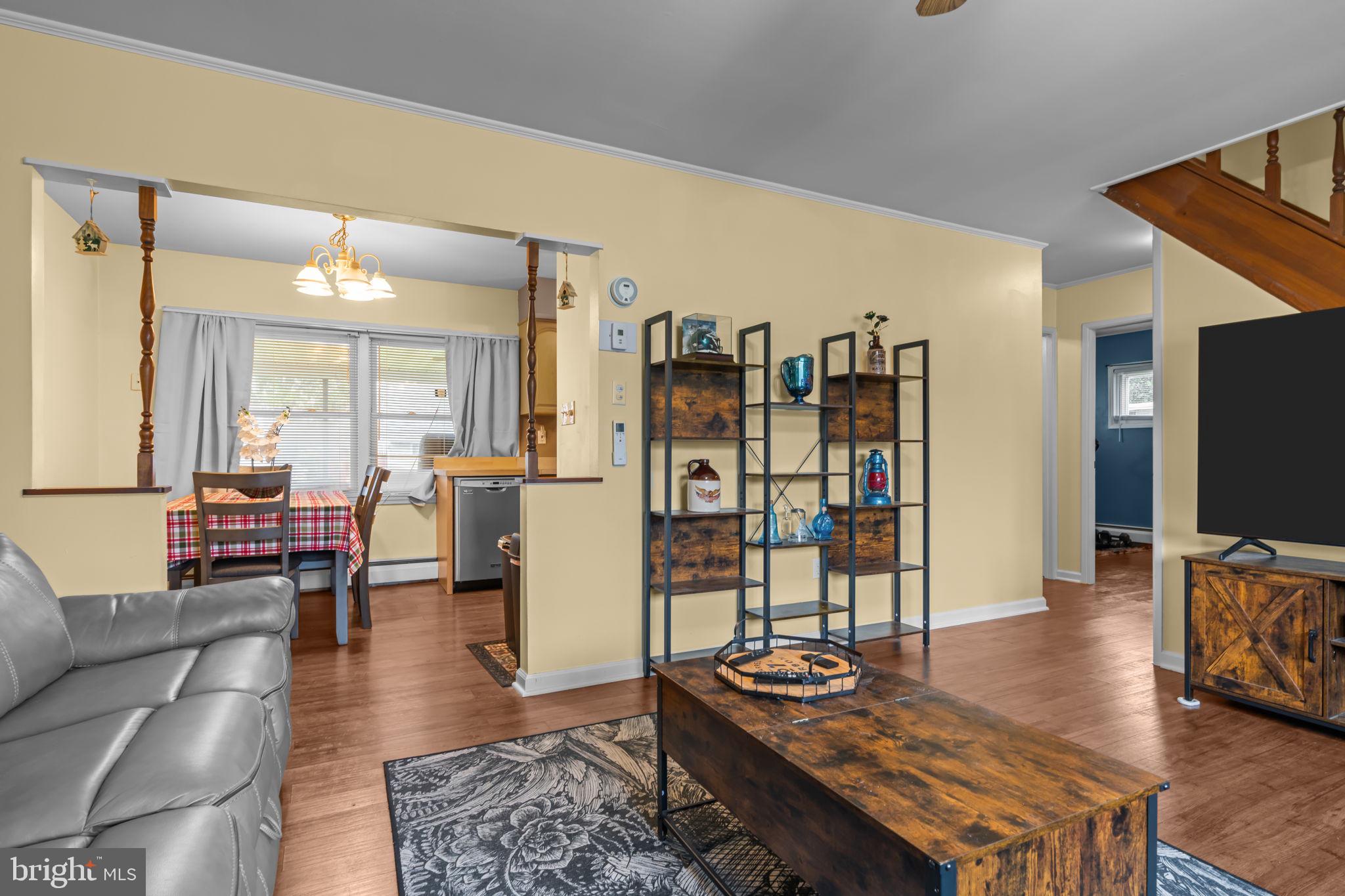 17 Middle Road Levittown, PA 19056 - Photo 5 of 22 a living room with furniture and a flat screen tv