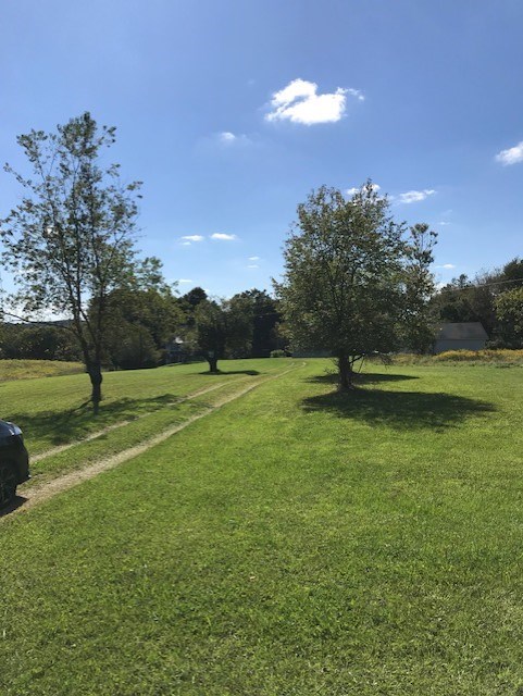 797 Wallacevile Road Titusville, PA 16354 - Photo 8 of 10 a view of a golf course with a lake