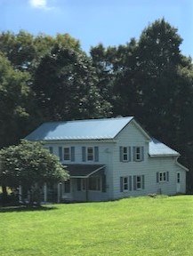 797 Wallacevile Road Titusville, PA 16354 - Photo 10 of 10 a front view of a house with a yard