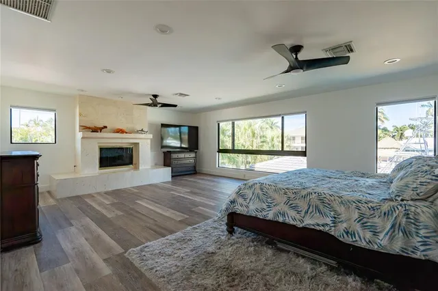 a living room with lots of furniture and a flat screen tv