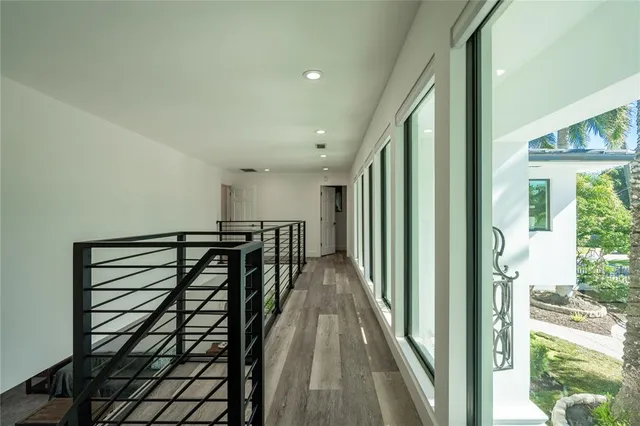 a swimming pool with outdoor seating