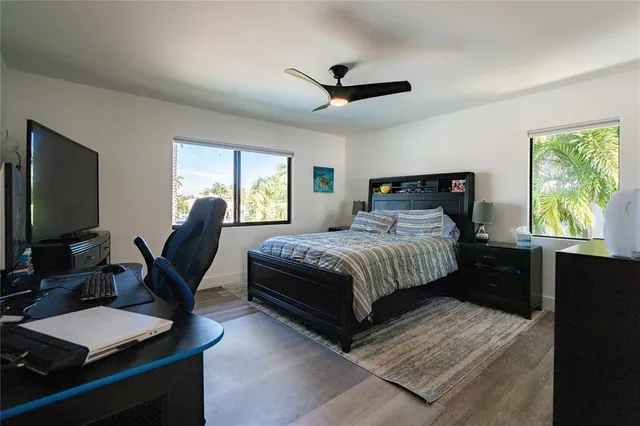 an aerial view of a city with lots of residential buildings ocean and ocean view