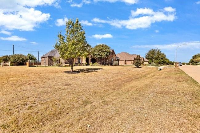 12901 Smokey Ranch Drive Fort Worth, TX 76052 - Photo 2 of 40 a view of open space with a garden