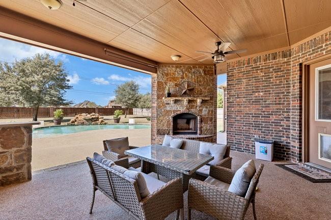 12901 Smokey Ranch Drive Fort Worth, TX 76052 - Photo 29 of 40 a outdoor space with patio the couches and a fireplace