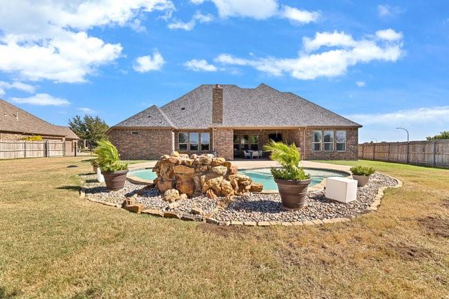 12901 Smokey Ranch Drive Fort Worth, TX 76052 - Photo 31 of 40 a front view of a house with patio
