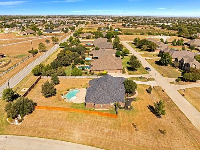 12901 Smokey Ranch Drive Fort Worth, TX 76052 - Photo 34 of 40 an aerial view of residential houses with outdoor space
