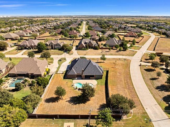 12901 Smokey Ranch Drive Fort Worth, TX 76052 - Photo 35 of 40 an aerial view of residential houses with outdoor space