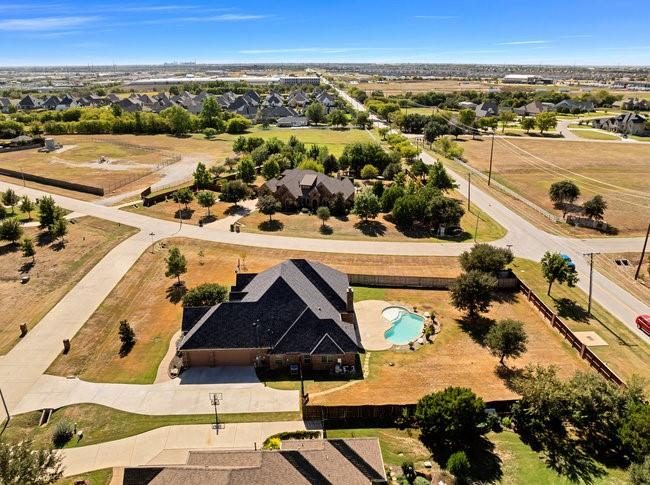 12901 Smokey Ranch Drive Fort Worth, TX 76052 - Photo 36 of 40 an aerial view of residential houses with outdoor space