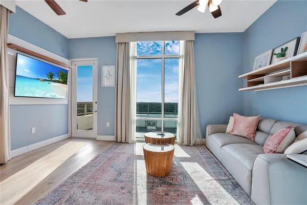 a view of balcony with furniture