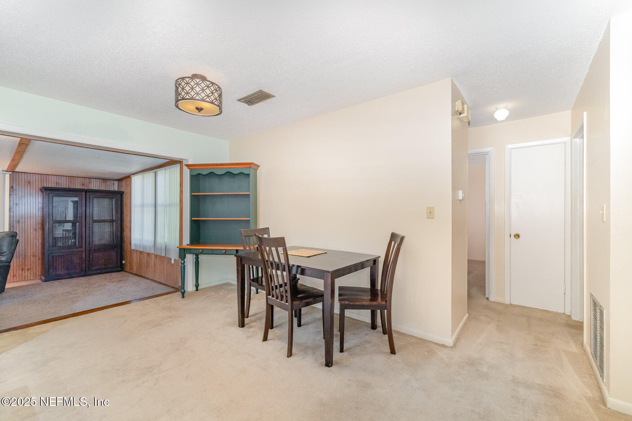 1330 Northeast 157 Avenue Williston, FL 32696 - Photo 14 of 22 a view of a dining room with furniture and window