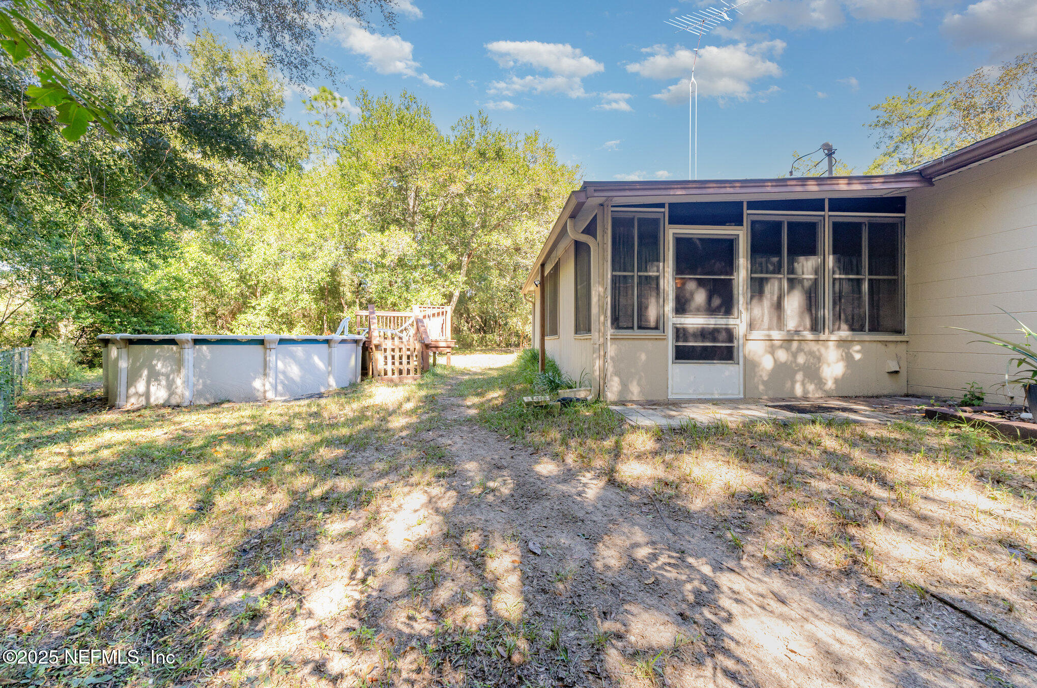 1330 Northeast 157 Avenue Williston, FL 32696 - Photo 21 of 22 a view of a house with backyard and sitting area