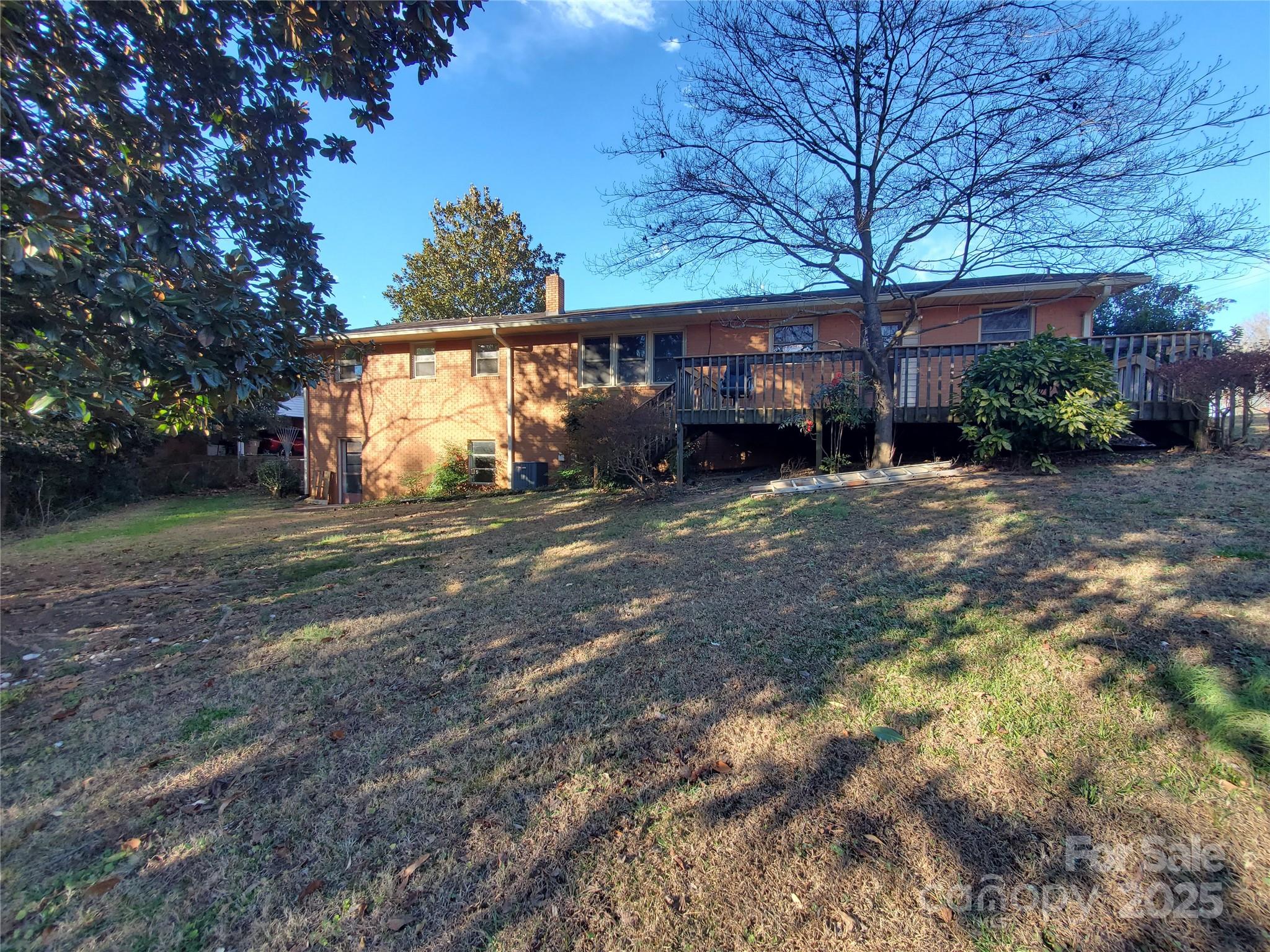 1303 Hunt Street Shelby, NC 28152 - Photo 13 of 16 a view of a house with a yard and tree