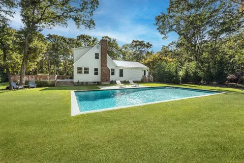 a view of a house with a big yard