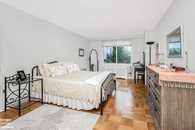 a kitchen with a stove a sink and a microwave