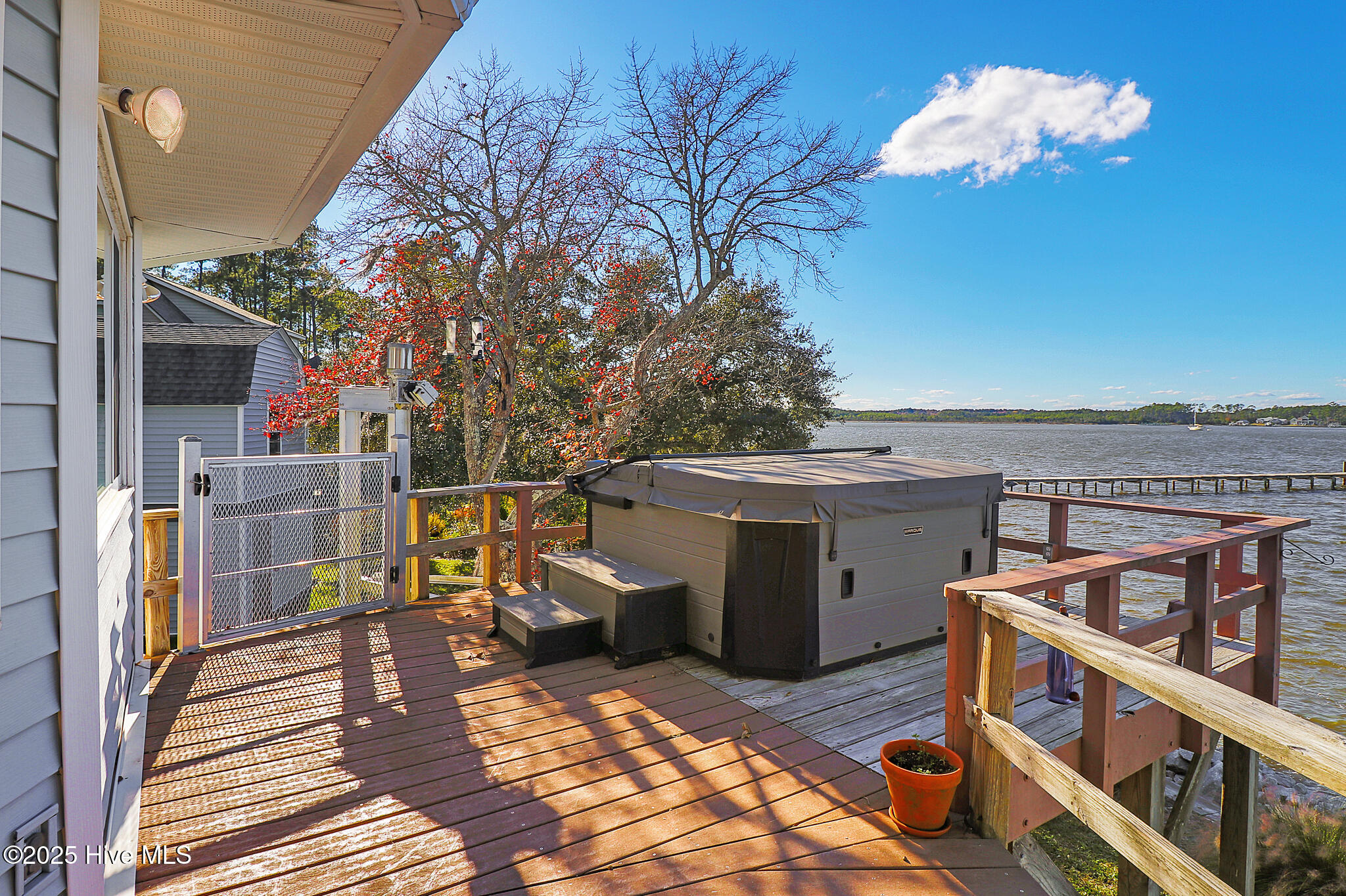 221 Creek Road Beaufort, NC 28516 - Photo 45 of 77 Hot tub with deck views
