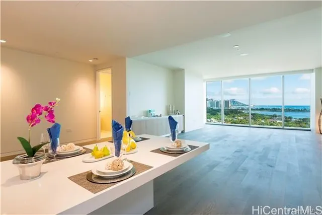 a living room with furniture and a table