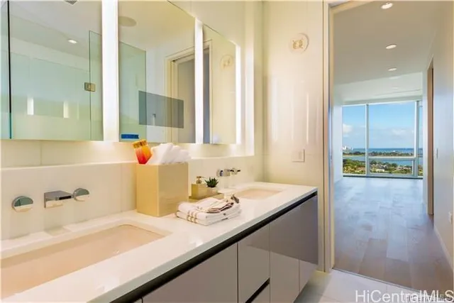 a bathroom with a sink and a mirror