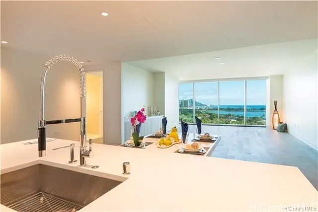 a living room with a couch and a large window