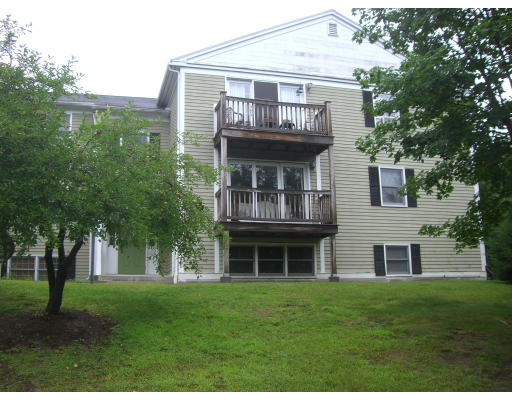 46 Evergreen Road, Unit 109 Northampton, MA 01053 - Photo 3 of 3 a view of house with yard and outdoor seating