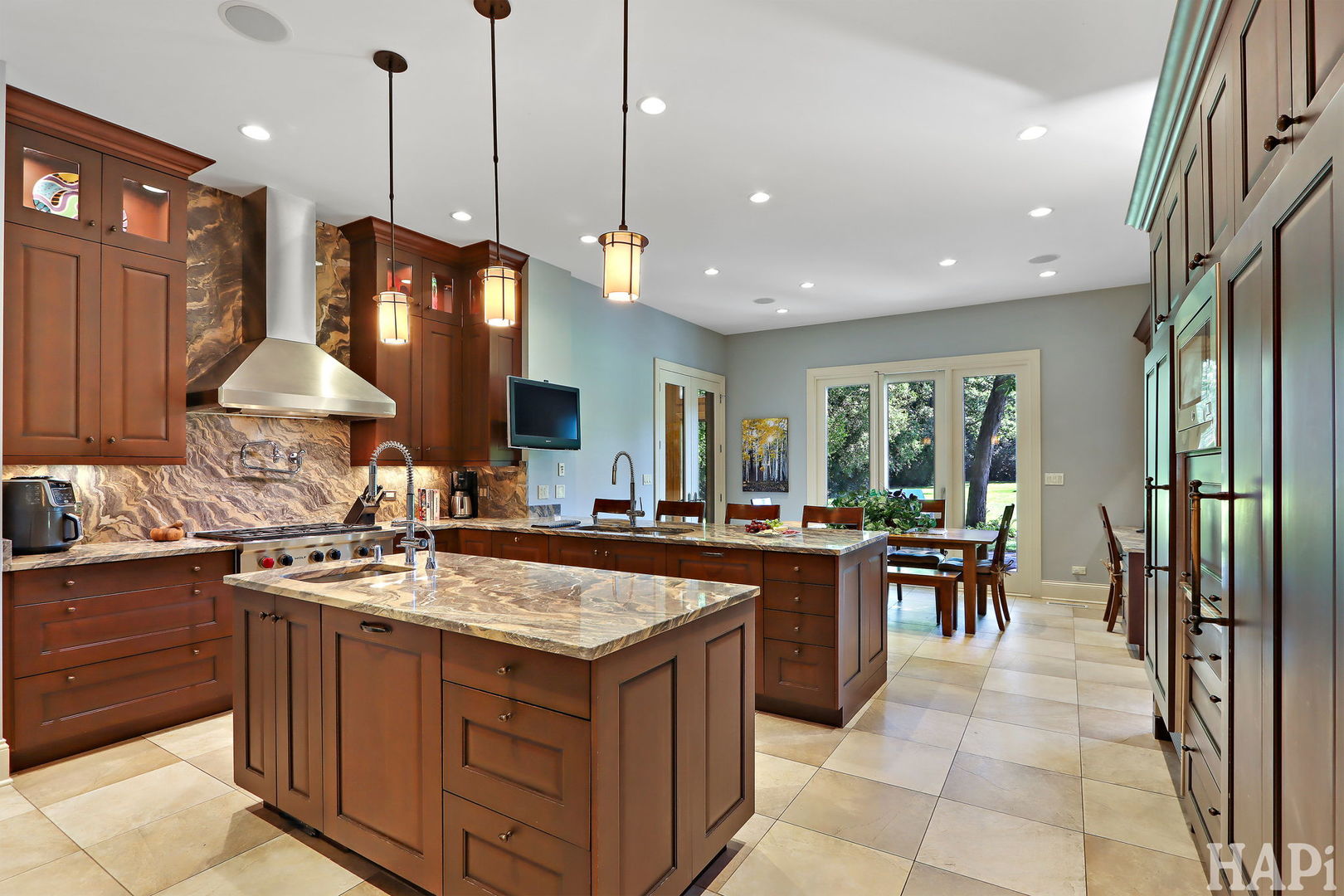 1425 Lee Road Northbrook, IL 60062 - Photo 13 of 53 a kitchen with a sink stove and cabinets