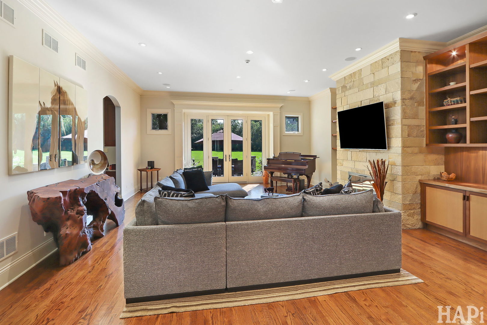 1425 Lee Road Northbrook, IL 60062 - Photo 16 of 53 a living room with furniture and a flat screen tv