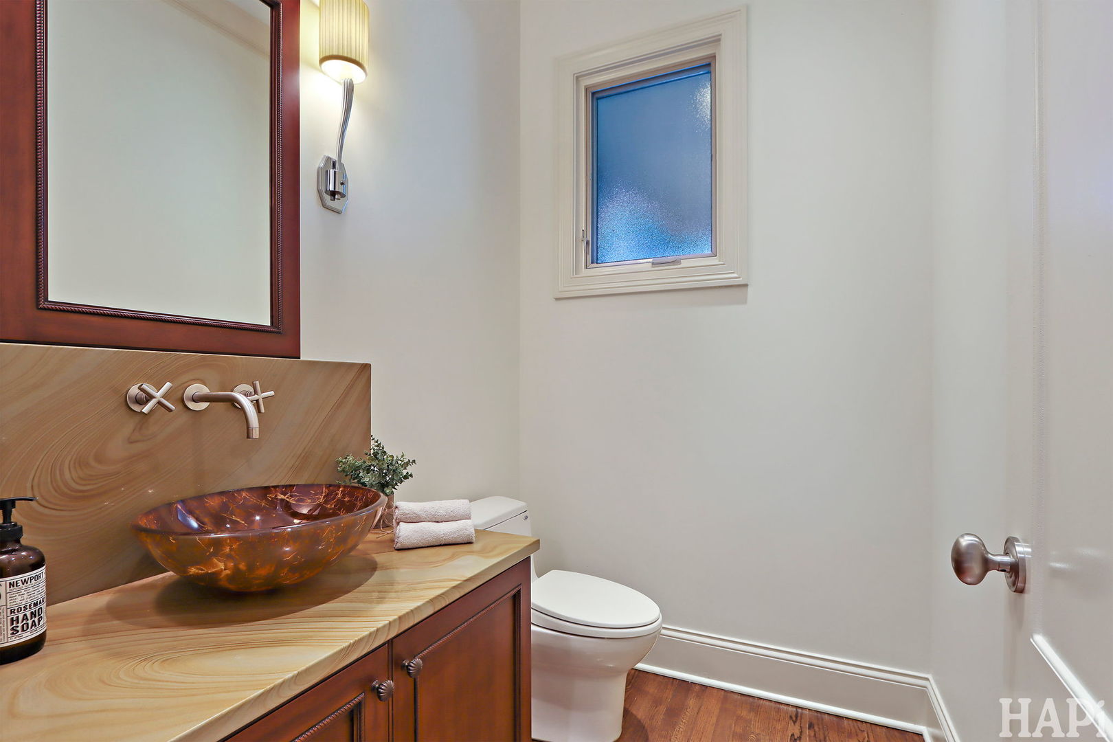 1425 Lee Road Northbrook, IL 60062 - Photo 20 of 53 a bathroom with a granite countertop sink and a toilet