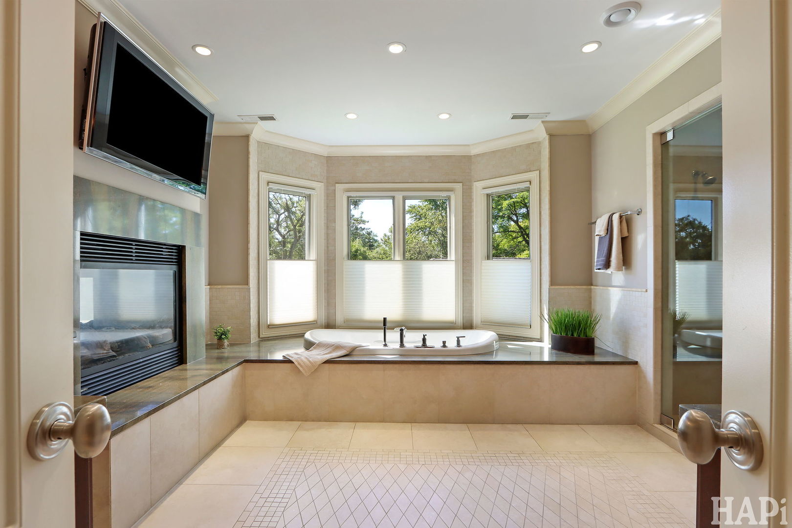 1425 Lee Road Northbrook, IL 60062 - Photo 29 of 53 a view of a living room with a fireplace and a large window