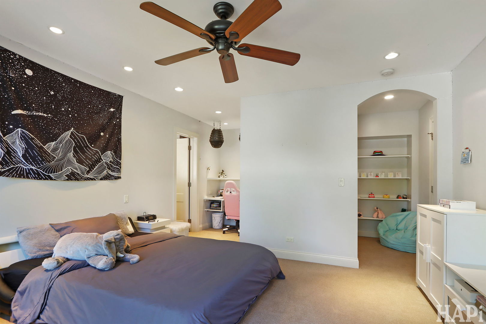 1425 Lee Road Northbrook, IL 60062 - Photo 39 of 53 a bedroom with a bed and a chandelier